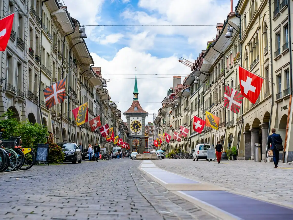 People walking on street near buildings during daytime — Bern old town, Switzerland