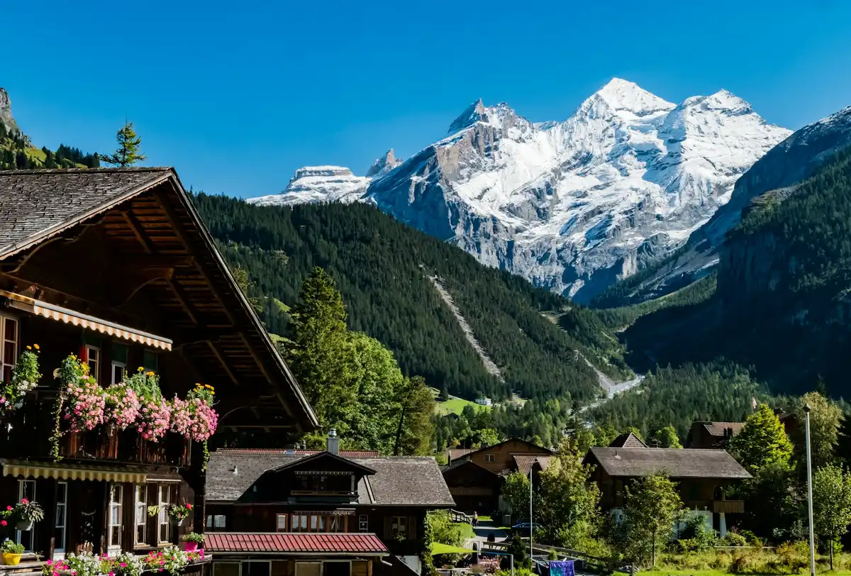 A view of a mountain range from a village — Kandersteg, Switzerland